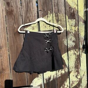 Black Pleated Skirt with Buckle Details